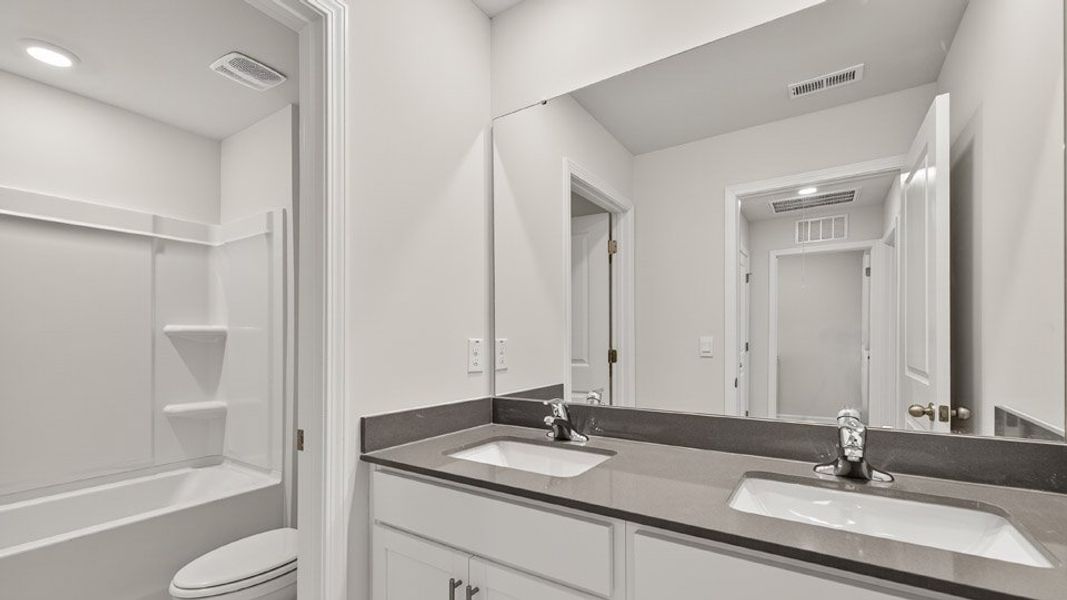 Image 24 representing the TAYLOR by D.R. Horton in Galvins Ridge, Sanford, NC.