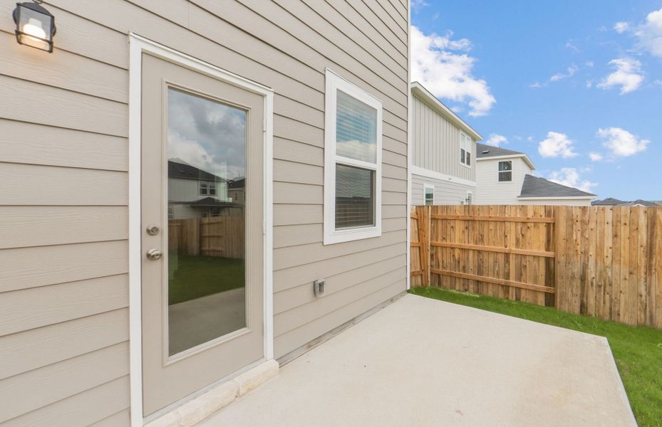 Exterior details and patio area of a home in Sunfield, Buda (Image 22).