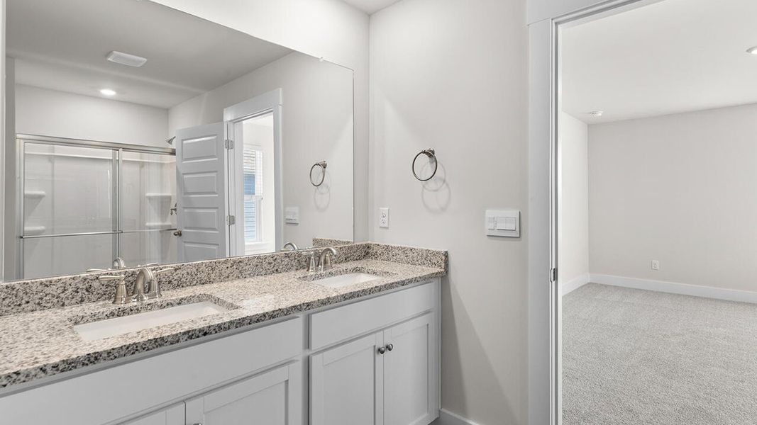 Furnished interior view inside a new home in The Haven at Indigo Preserve, Leland (Image 13).