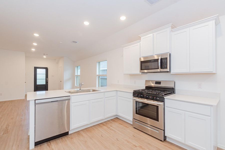 Furnished interior view inside a new home in Newport Preserve, Crosby (Image 11).