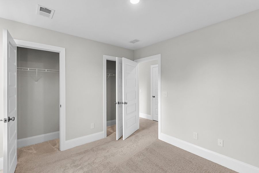 Spacious, unfurnished interior of a new home in Pineland Preserve, Summerville (Image 38).