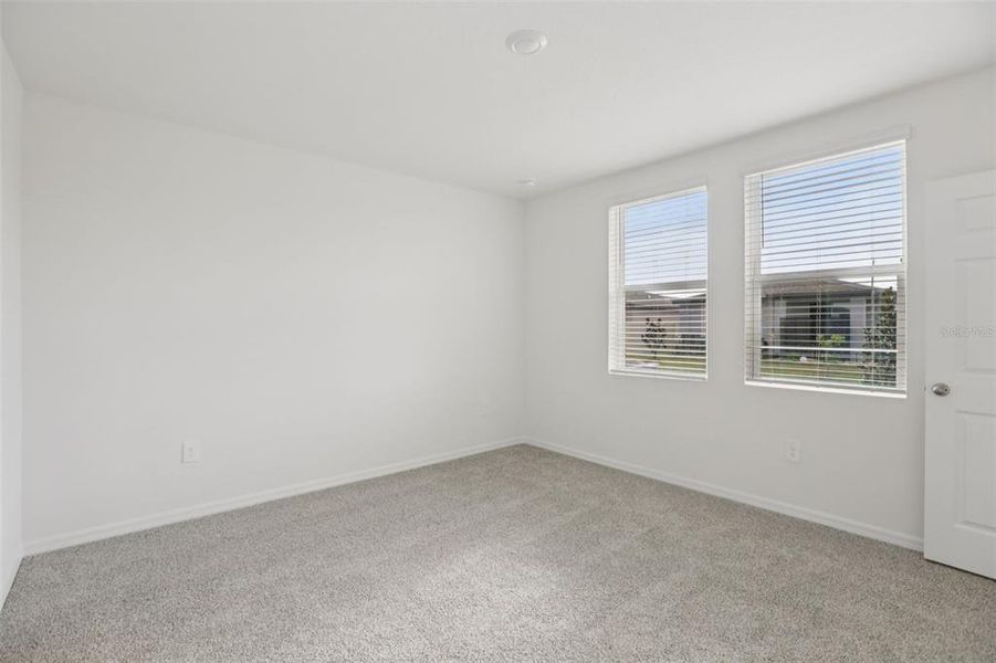 Spacious, unfurnished interior of a new home in Springs at Lake Alfred - Classic Series, Lake Alfred (Image 28).