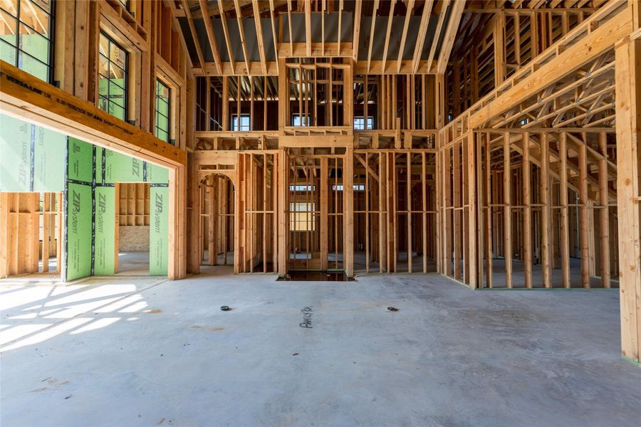 The heart of the home begins to reveal itself an expansive family room framed by soaring proportions, destined to be a gathering place defined by light, volume, and connection.