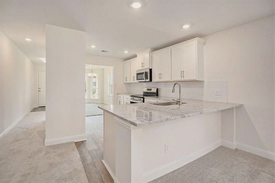 Furnished interior view inside a new home in Kiber Reserve, Angleton (Image 5).