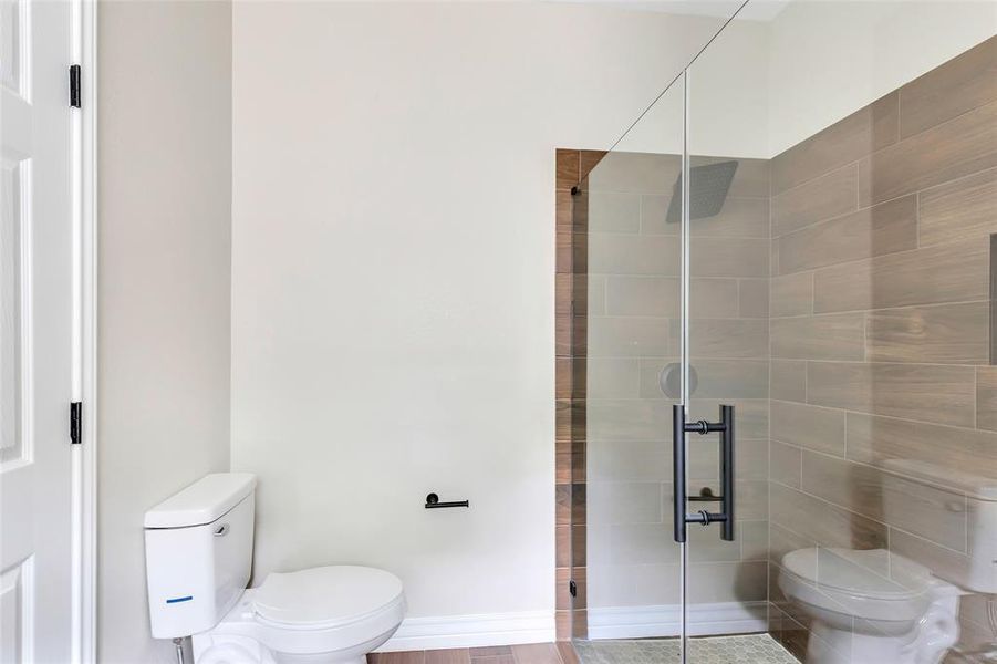 Primary bathroom with large walk in shower.