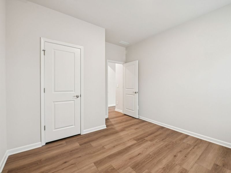 Spacious, unfurnished interior of a new home in Marshburn Landing - Signature Series, Wendell (Image 12).