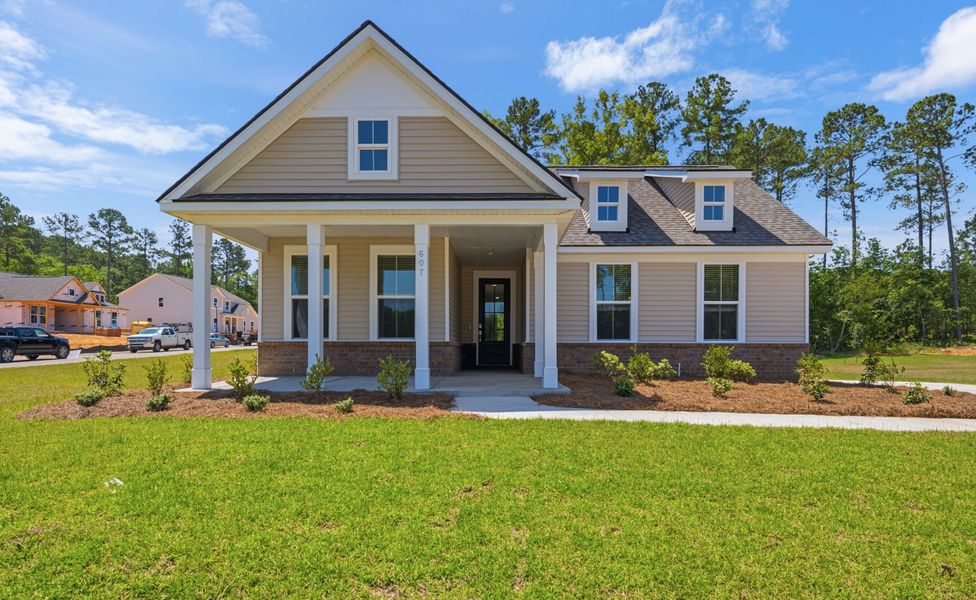 Front exterior of a new home in Oakleaf Chase, Blythewood, SC, highlighting curb appeal (Image 20). Front exterior of a new home in Oakleaf Chase, Blythewood, SC, highlighting curb appeal (Image 20).
