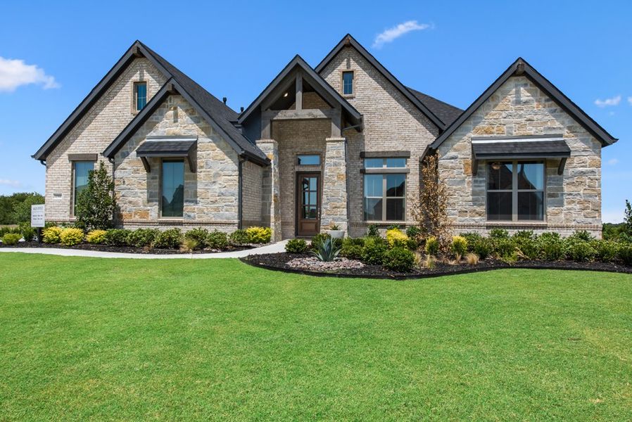 Representative exterior photo of a completed home built from the Carleigh by Our Country Homes in Enchanted Creek, Lucas, TX (Image 8).