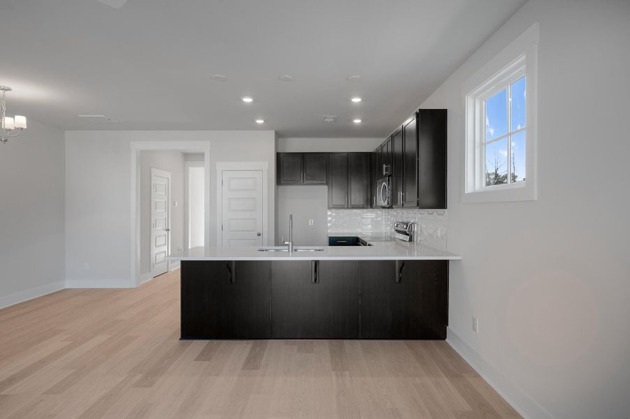 Furnished interior view inside a new home in Windward Townes, Goose Creek (Image 9).