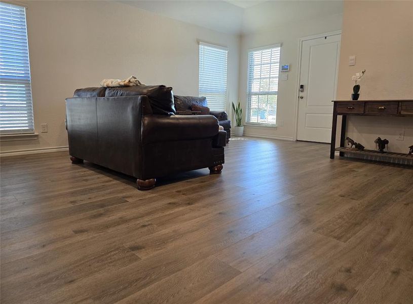 Living room featuring dark hardwood / wood-style floors