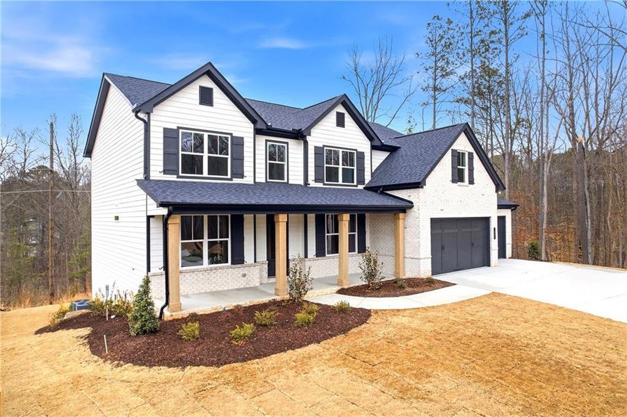 Front exterior of a new home in Sterlington, Canton, GA, highlighting curb appeal (Image 24).