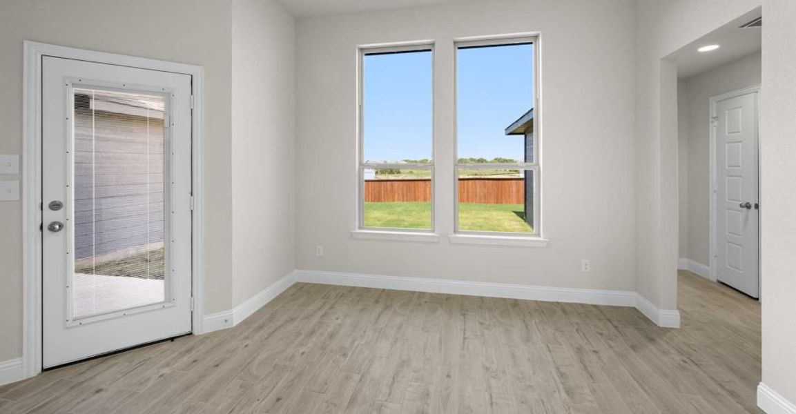 Representative exterior photo of a completed home built from the Alderbury by Impression Homes in Timberbrook, Justin, TX (Image 11).