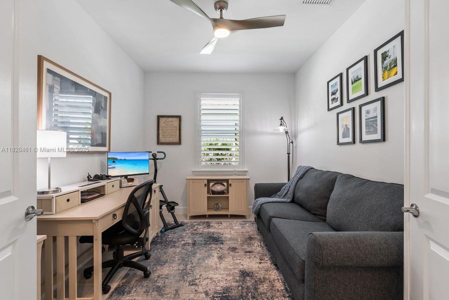 Furnished interior view inside a new home in Del Webb Naples, Ave Maria (Image 25).