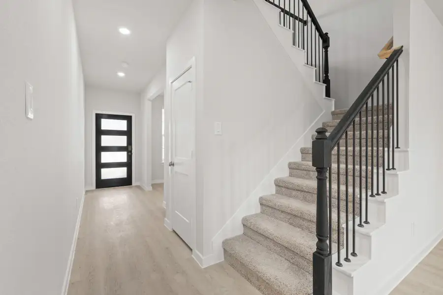 Spacious, unfurnished interior of a new home in Sunterra, Katy (Image 6). Spacious, unfurnished interior of a new home in Sunterra, Katy (Image 6).