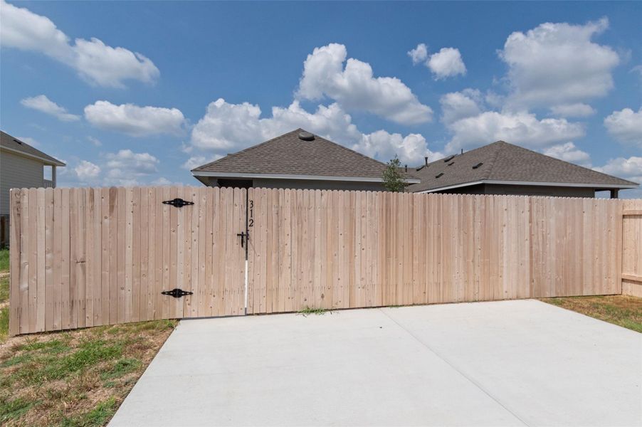 Front exterior of a new home in Blanco Vista, San Marcos, TX, highlighting curb appeal (Image 22).