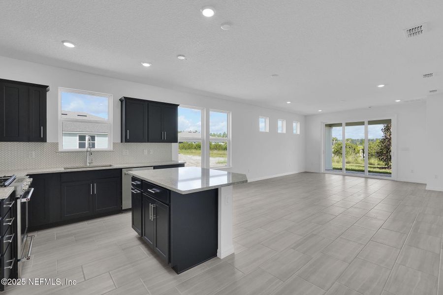 Furnished interior view inside a new home in Del Webb Wildlight, Yulee (Image 14).
