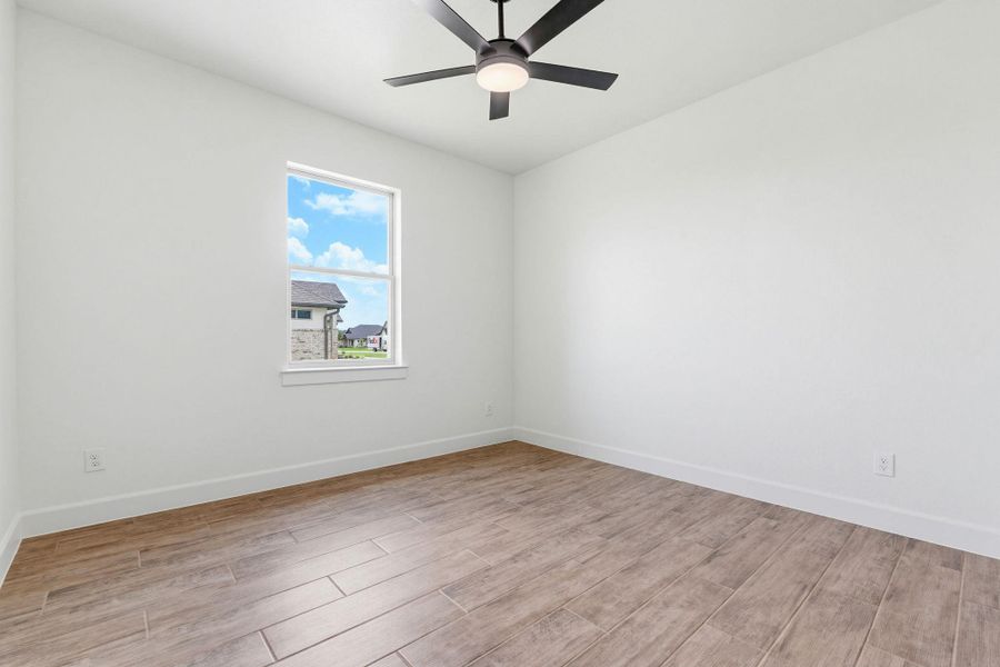 Bright and airy, this room features durable tile flooring and a refreshing ceiling fan for comfort. Bright and airy, this room features durable tile flooring and a refreshing ceiling fan for comfort.
