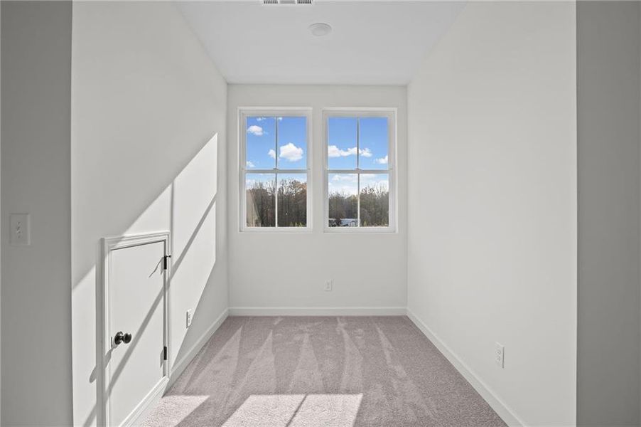Spacious, unfurnished interior of a new home in The Village at River Green, Canton (Image 29).