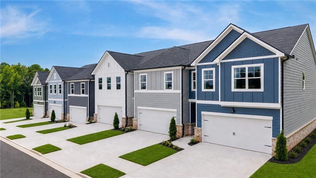 Front exterior of a new home in , Conyers, GA, highlighting curb appeal (Image 1). Front exterior of a new home in , Conyers, GA, highlighting curb appeal (Image 1).