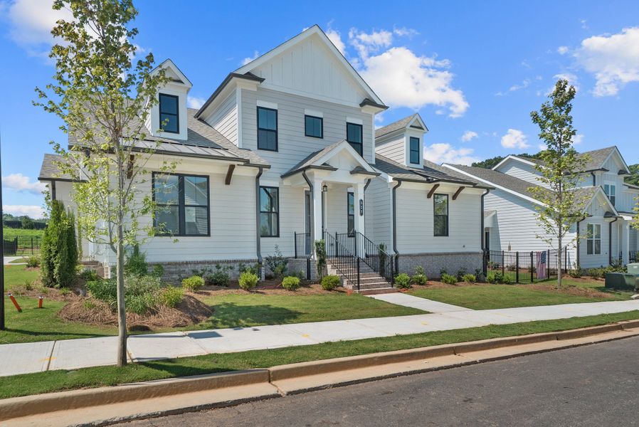 Representative exterior photo of a completed home built from the The Lassiter by The Providence Group in Promenade at Sawnee Village, Cumming, GA (Image 2). Representative exterior photo of a completed home built from the The Lassiter by The Providence Group in Promenade at Sawnee Village, Cumming, GA (Image 2).