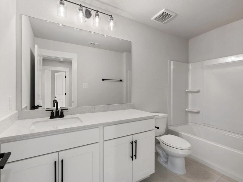 Furnished interior view inside a new home in Lake Park Villas, Wylie (Image 15).