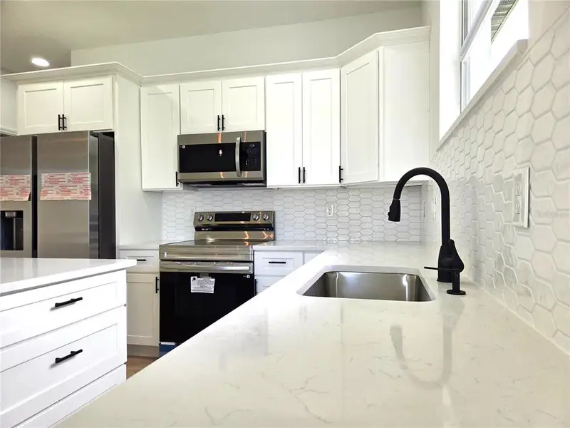 Furnished interior view inside a new home in , Port Charlotte (Image 5).