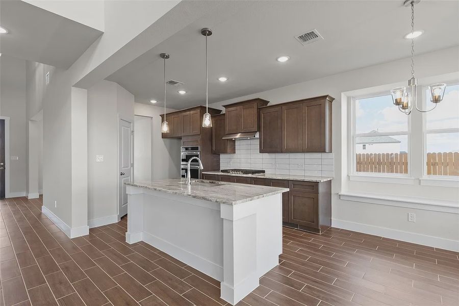 Furnished interior view inside a new home in The Grove at Blackhawk, Pflugerville (Image 7).
