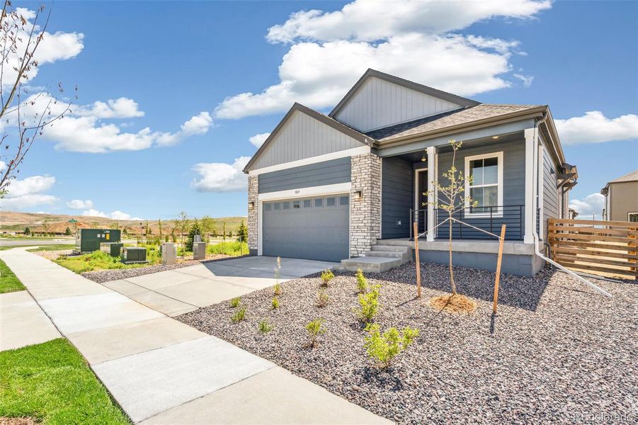 Front exterior of a new home in Legato, Commerce City, CO, highlighting curb appeal (Image 20).