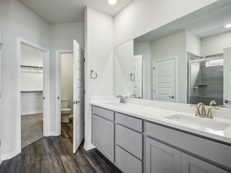 Live luxuriously with this home's primary bathroom.