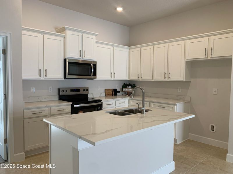 Furnished interior view inside a new home in St. John Preserve, Palm Bay (Image 4). Furnished interior view inside a new home in St. John Preserve, Palm Bay (Image 4).