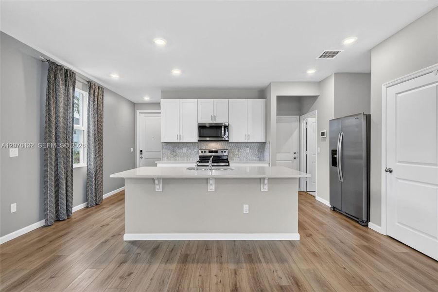 Furnished interior view inside a new home in , Stuart (Image 11).