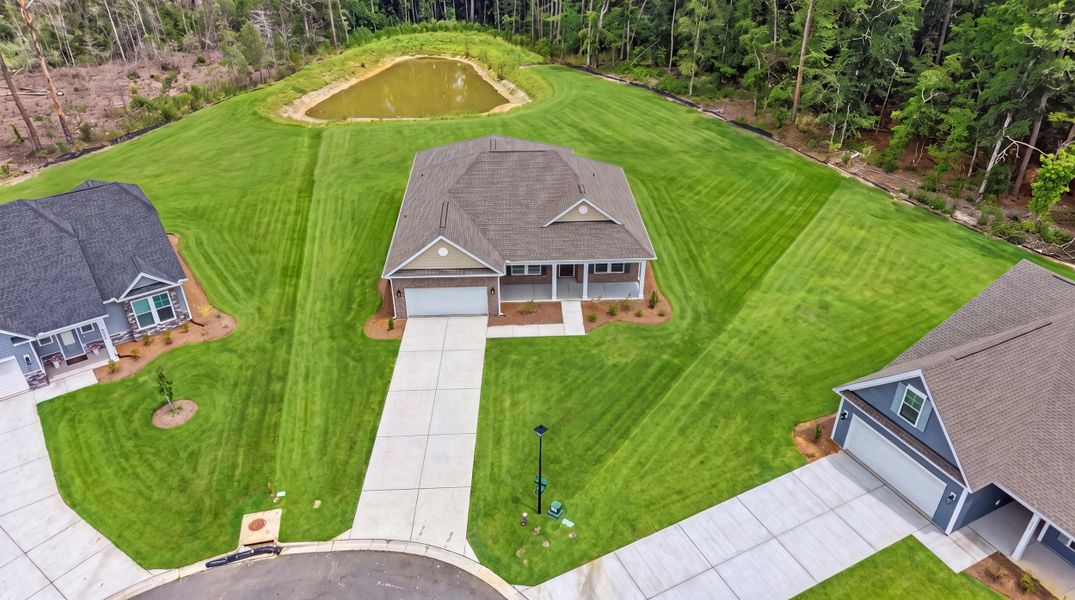 Exterior details and patio area of a home in Oak Grove, Conway (Image 18).