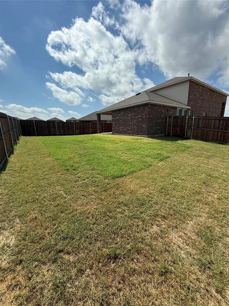 Exterior details and patio area of a home in Travis Ranch Marina, Forney (Image 24).