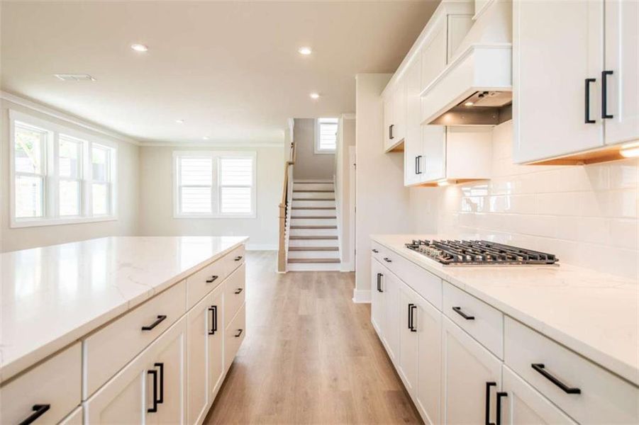 Furnished interior view inside a new home in The Paddocks at Doc Hughes, Buford (Image 5).