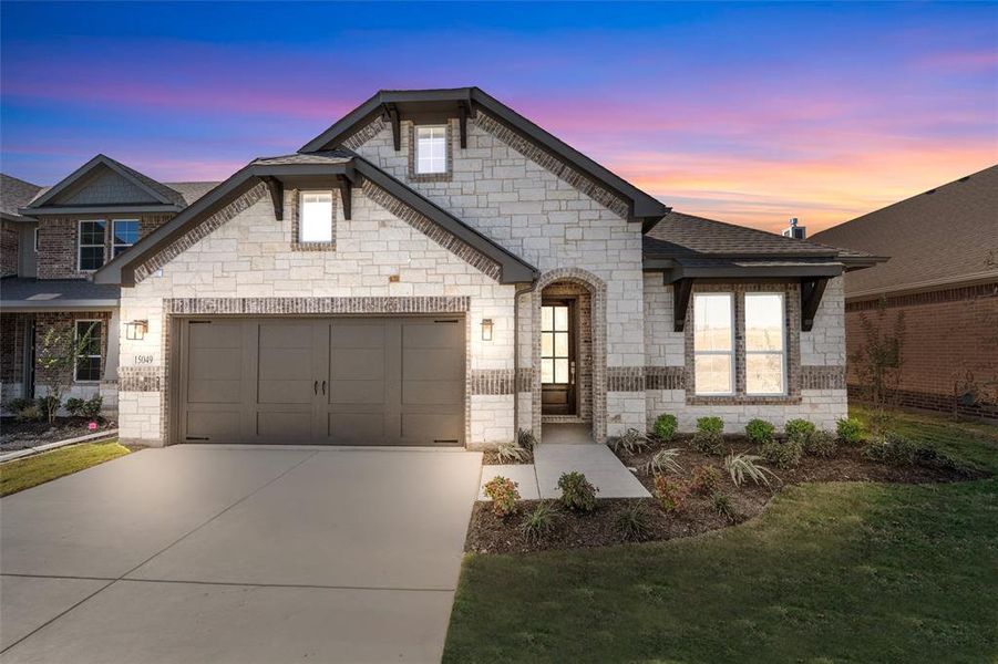 Front exterior of a new home in Morningstar, Aledo, TX, highlighting curb appeal (Image 1).