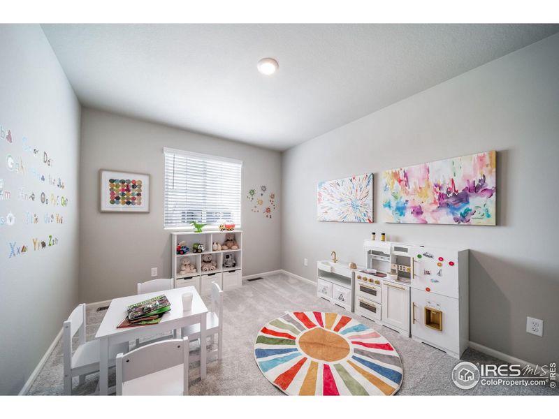 Furnished interior view inside a new home in Thompson River Ranch, Johnstown (Image 13).