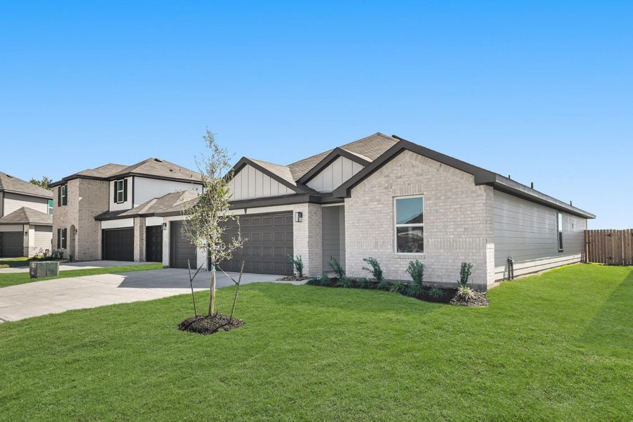 Front exterior of a new home in Medina, Dayton, TX, highlighting curb appeal (Image 7).