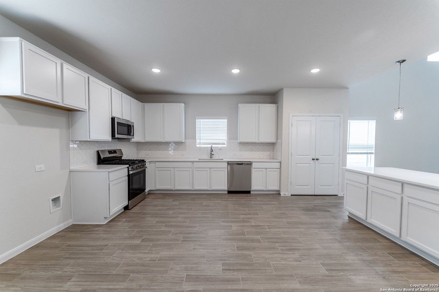 Furnished interior view inside a new home in Hunter's Ranch, San Antonio (Image 7).
