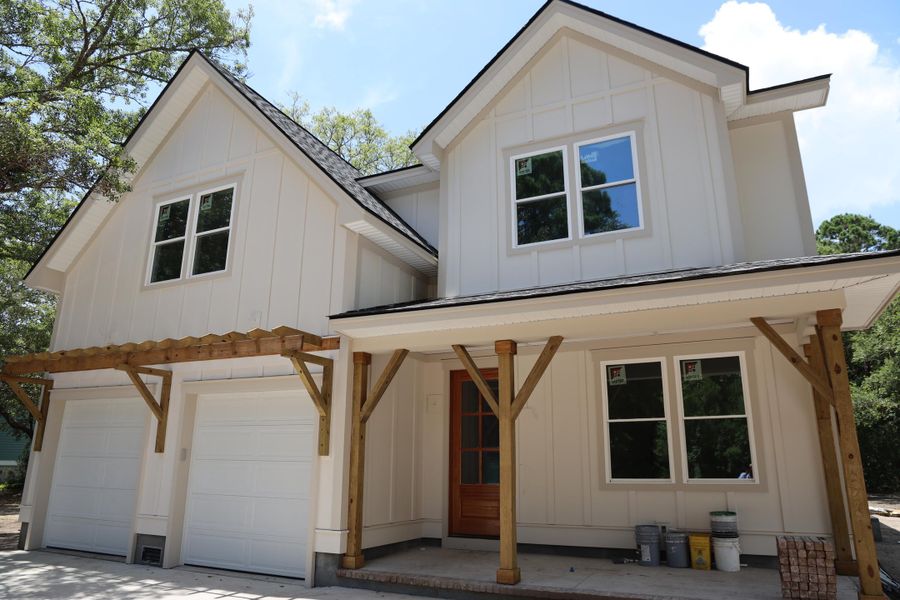 Front exterior of a new home in , Awendaw, SC, highlighting curb appeal (Image 17). Front exterior of a new home in , Awendaw, SC, highlighting curb appeal (Image 17).