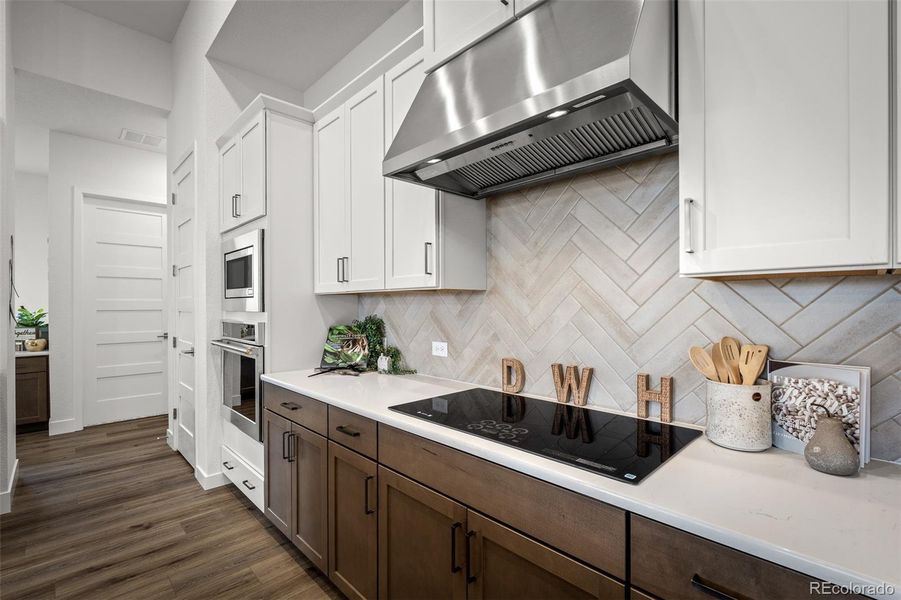 Furnished interior view inside a new home in Cloverleaf - Pinnacle Collection, Monument (Image 6).