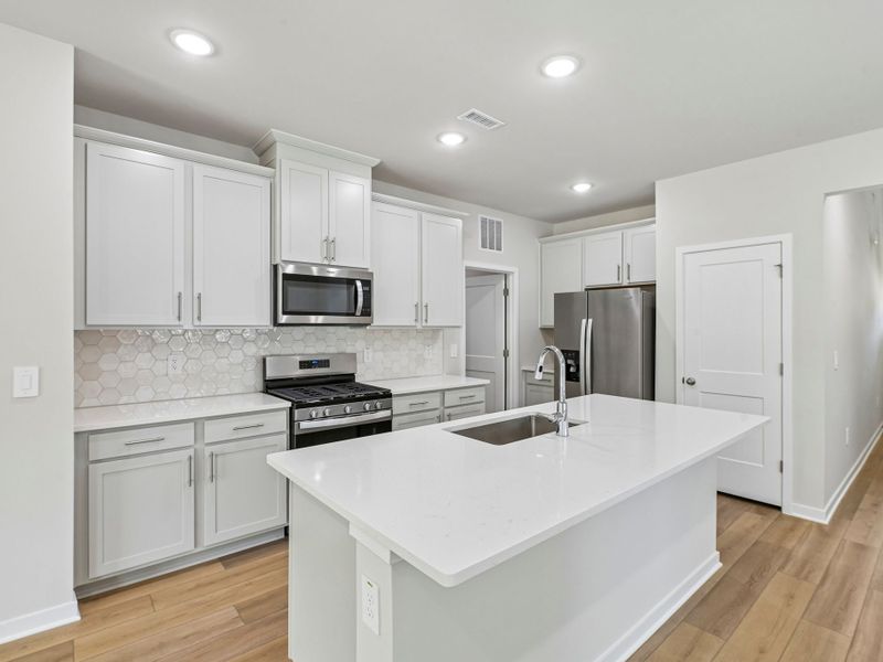 Furnished interior view inside a new home in Avalon Place - Classic Series, Durham (Image 3).