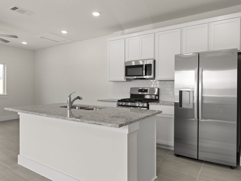 Furnished interior view inside a new home in Saddle Creek Twinhomes, Georgetown (Image 5).
