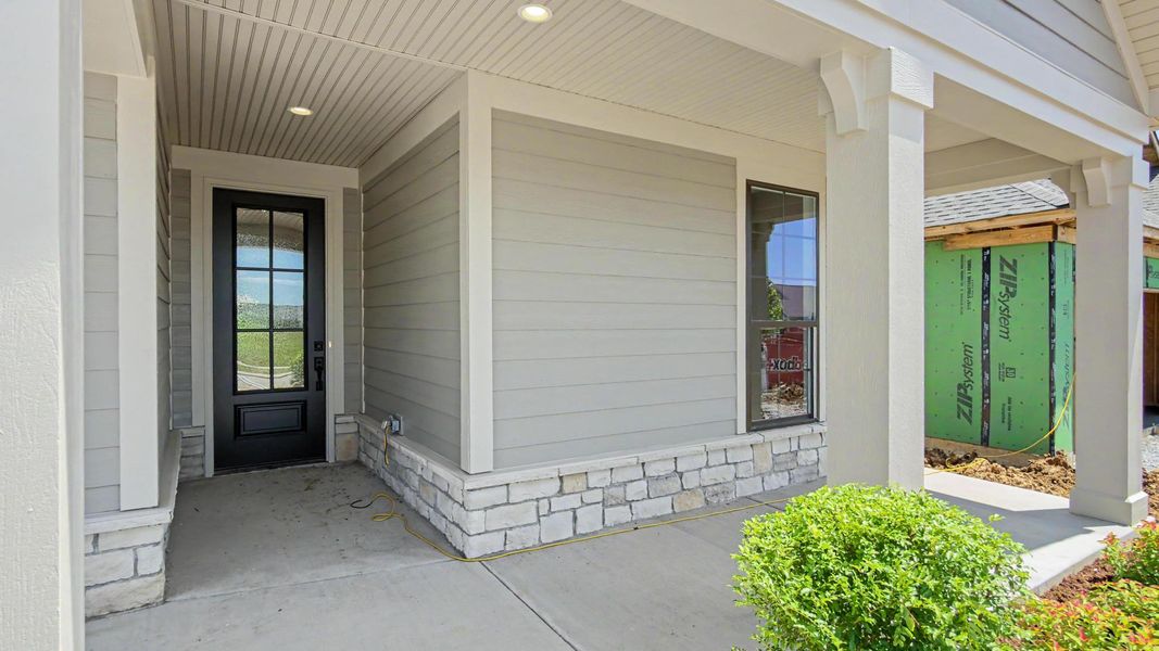 Exterior details and patio area of a home in The Courtyards at Curry Farms, Louisville (Image 4). Exterior details and patio area of a home in The Courtyards at Curry Farms, Louisville (Image 4).