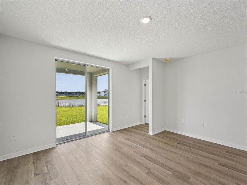 Spacious, unfurnished interior of a new home in Coasterra - Premier Series, Palmetto (Image 17).