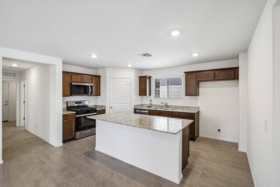 Furnished interior view inside a new home in Mandarina Reserve, Marana (Image 6).