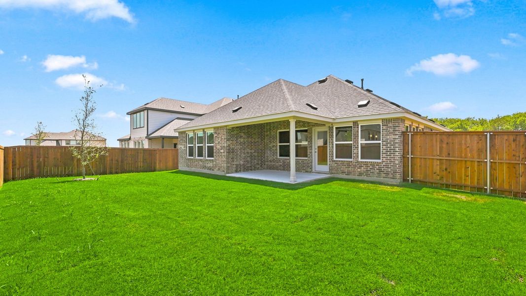 Exterior details and patio area of a home in Anna Ranch, Anna (Image 22).