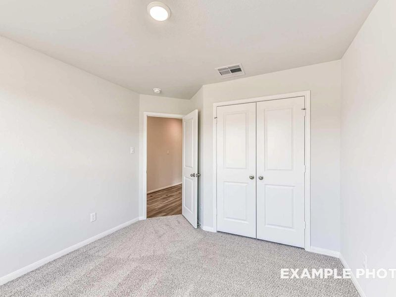 Spacious, unfurnished interior of a new home in Sunterra, Katy (Image 27).