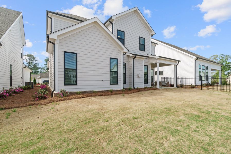 Representative exterior photo of a completed home built from the The Bullard by The Providence Group in Promenade at Sawnee Village, Cumming, GA (Image 24).