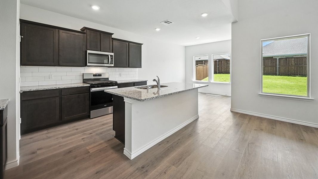 Representative furnished interior of a home built from the Tangerine by D.R. Horton in Winchester Crossing, Princeton (Image 5). Representative furnished interior of a home built from the Tangerine by D.R. Horton in Winchester Crossing, Princeton (Image 5).