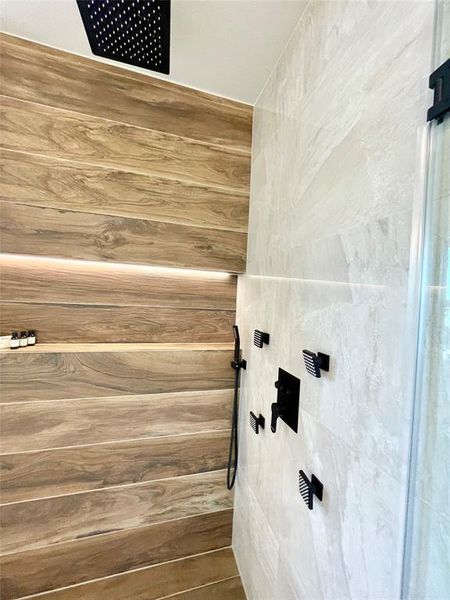 Bathroom with a tile shower